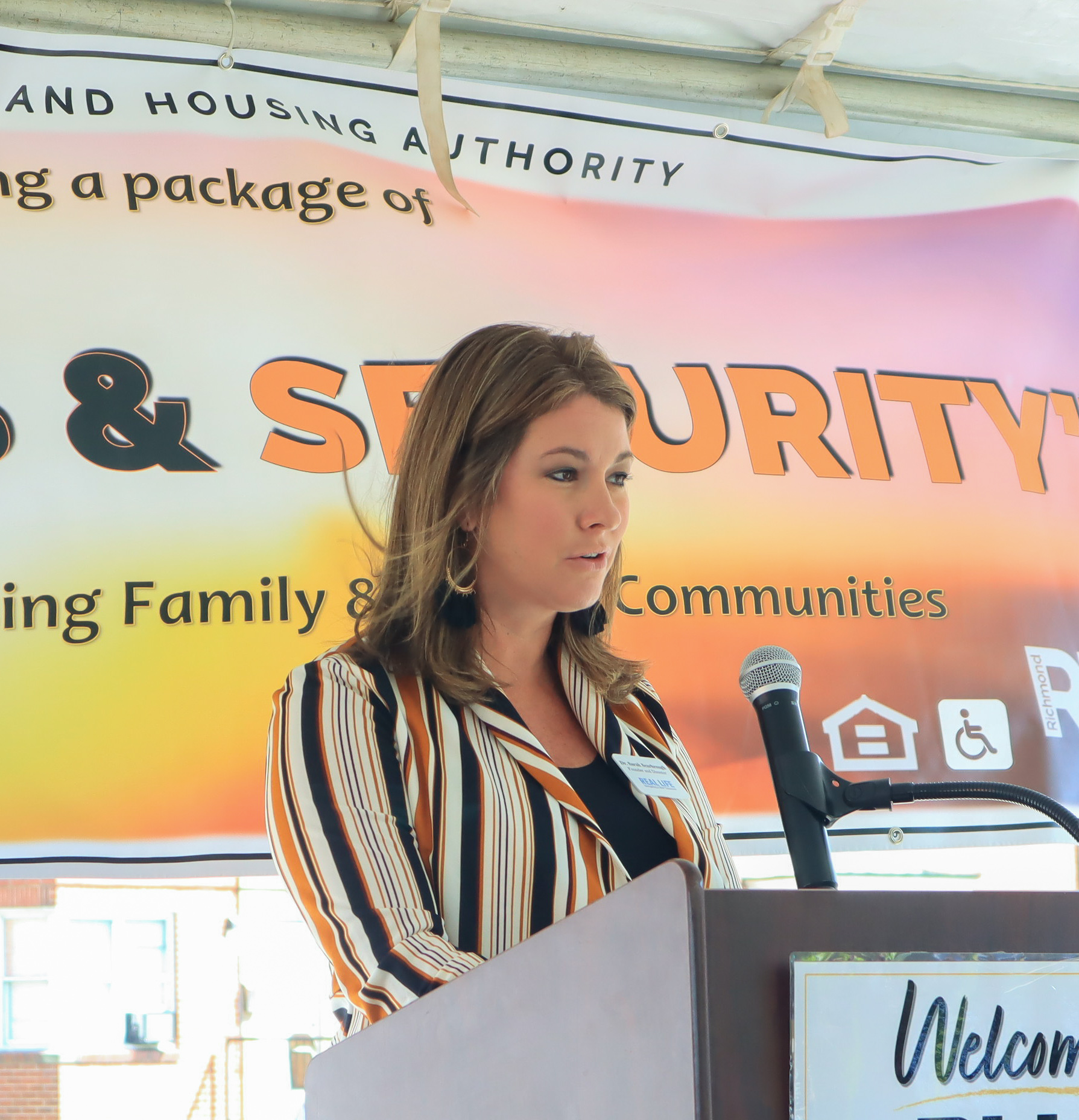 Dr. Sarah Scarbrough speaking at RRHA announcement